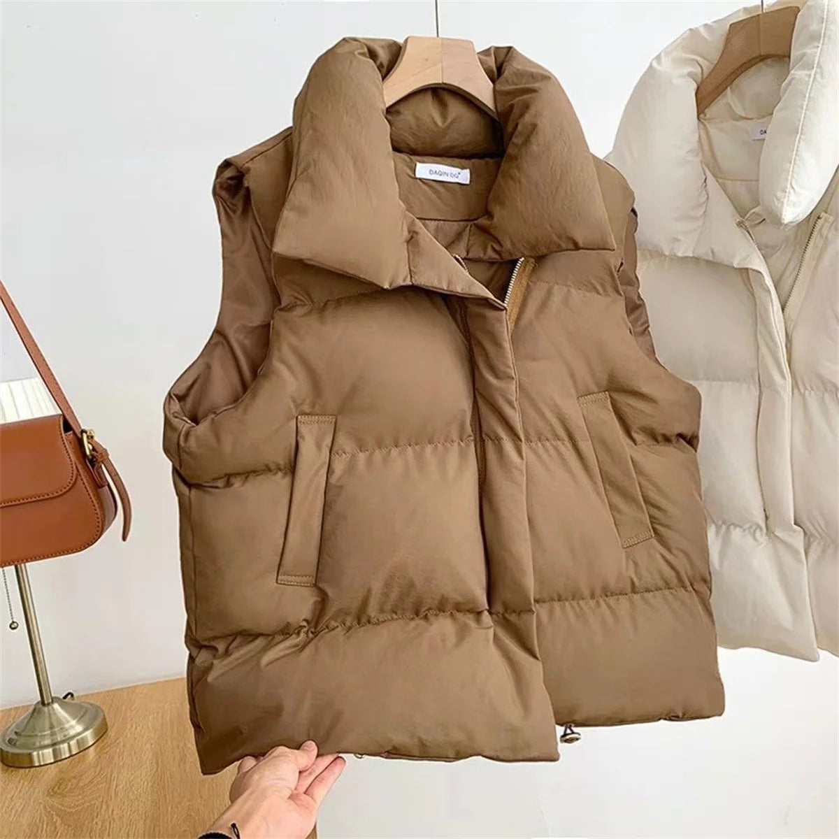 Women Fashion Autumn New 2025 Stand Collar Elegant Down Coats Warm Outerwear Casual Belt Sleeveless Winter Women Vests Jackets
